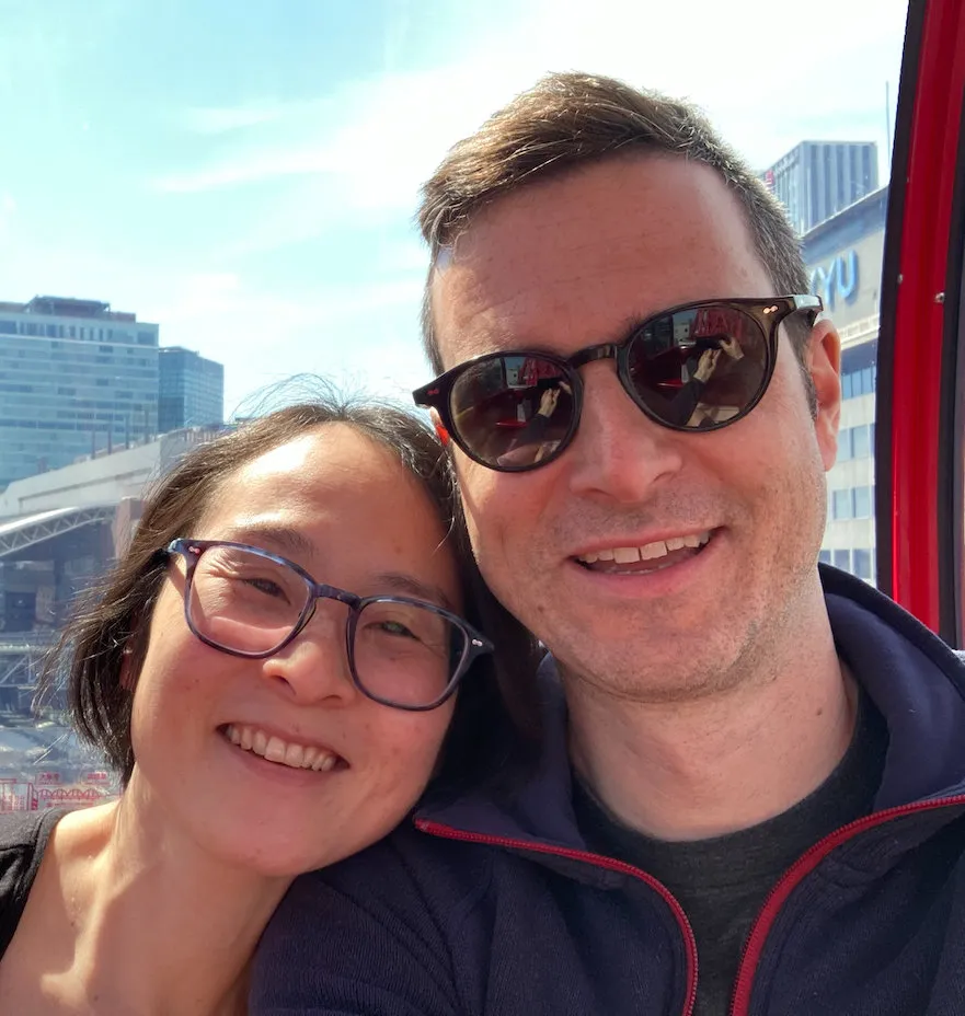 Geoff and his wife smiling for a selfie